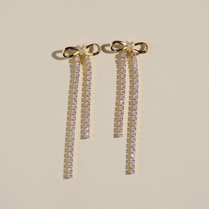 Gold Long Crystal Bow Drop Studs: Gold