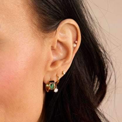 Green Baguette Bezel Huggies in Gold: Gold
