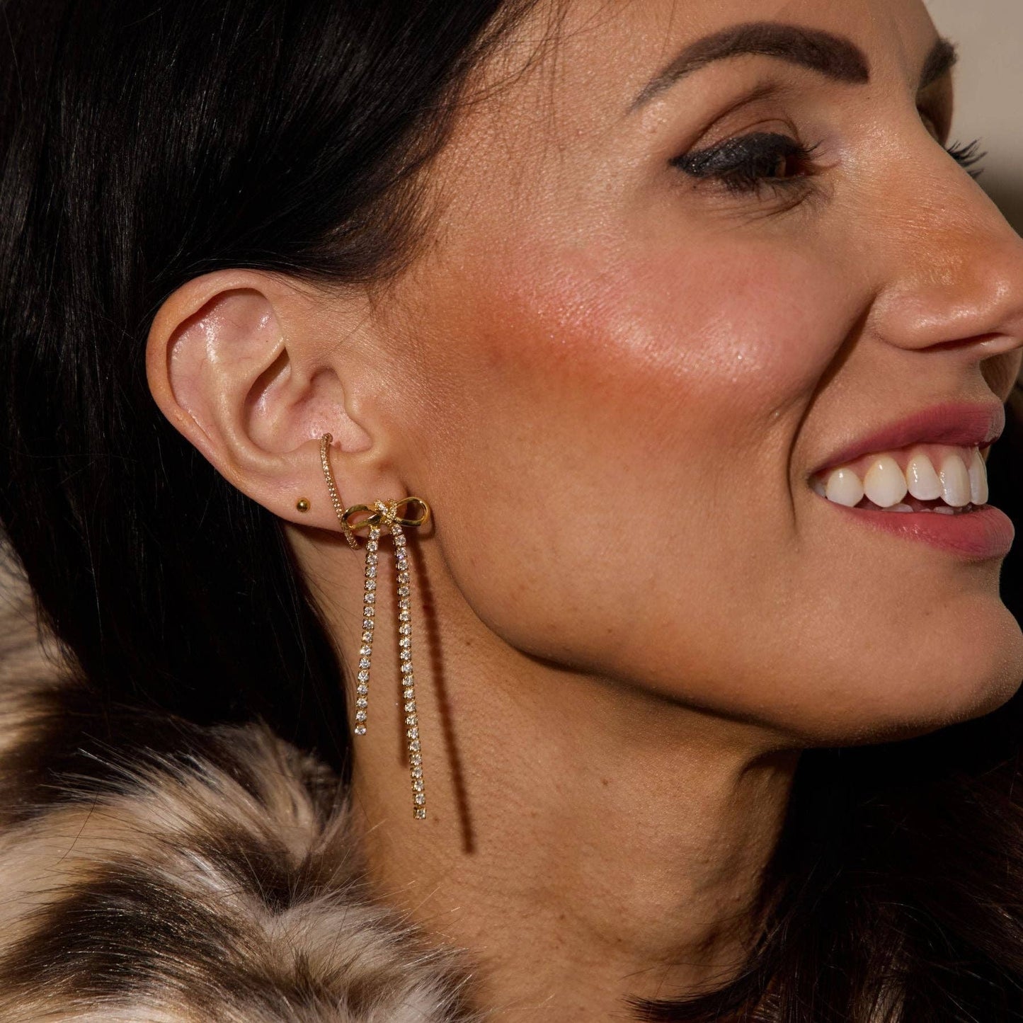 Gold Long Crystal Bow Drop Studs: Gold